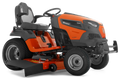 Orange and black riding lawn mower on a white background