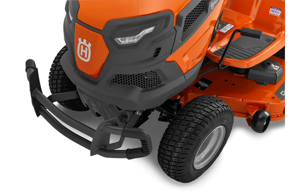Close-up of a Husqvarna riding lawn mower on a white background