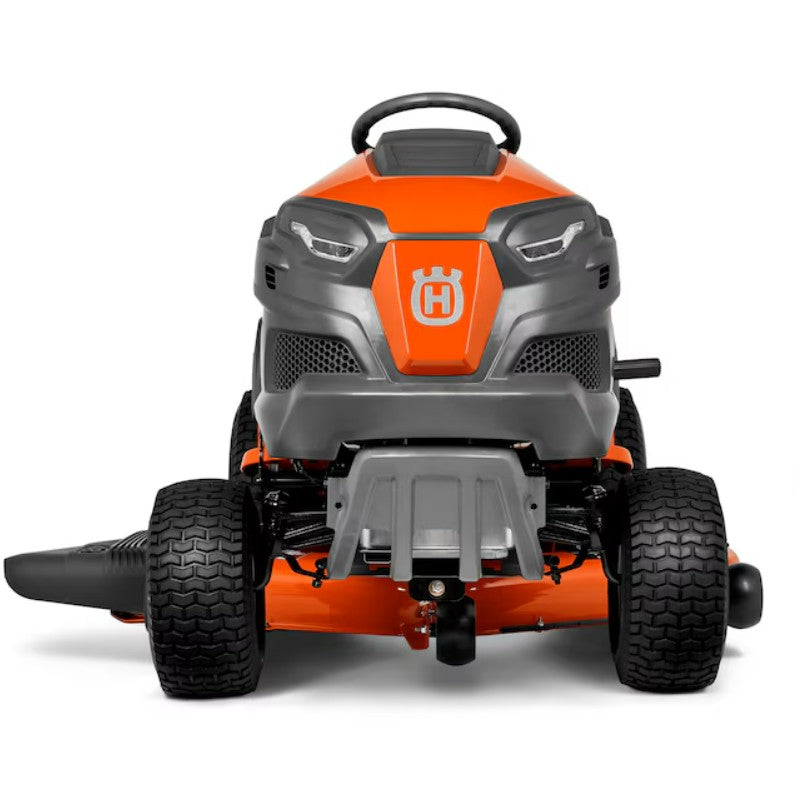Orange and gray Husqvarna riding lawn mower on a white background